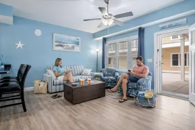 Relax in an open living room & kitchen with sleeper sofa, mounted smart TV, strong WiFi and fully-equipped kitchen.