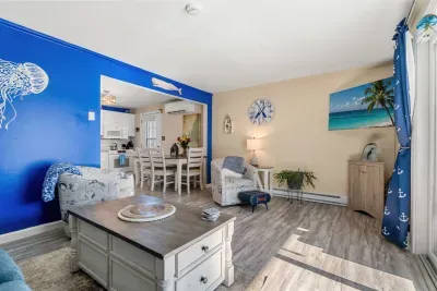 The living room has a smart tv and a pull out sofa!