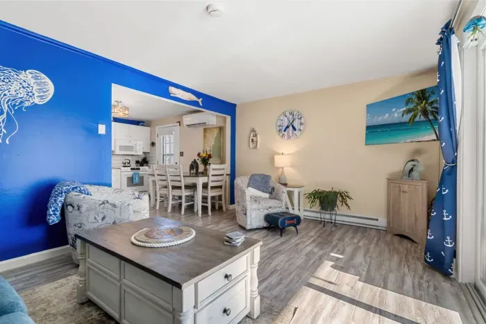 The living room has a smart tv and a pull out sofa!