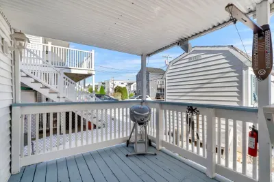 The deck with grill, ring toss, seating for 8, and Jenga!