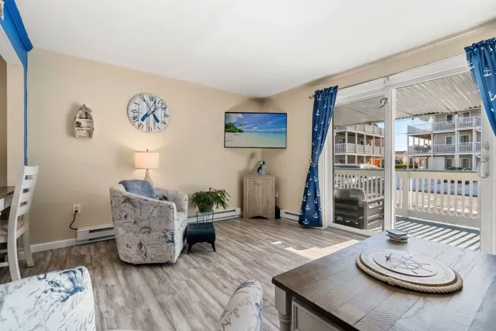 The living room has a smart tv and a pull out sofa!