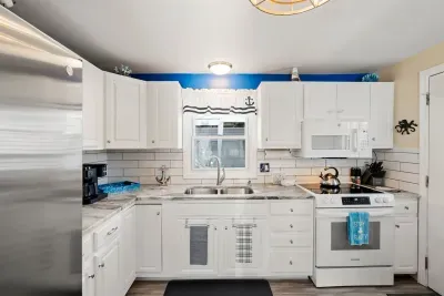 Fully equipped kitchen with updated appliances