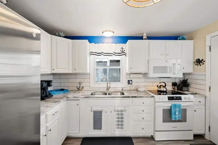 Fully equipped kitchen with updated appliances