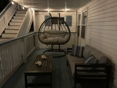 The deck with the outdoor furniture!
