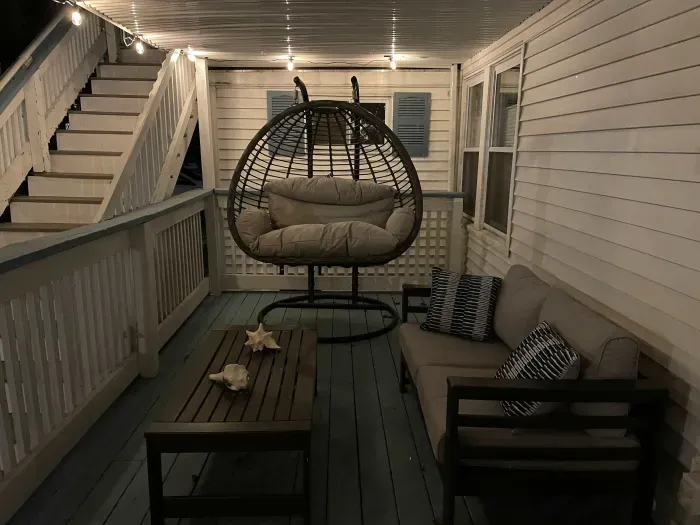 The deck with the outdoor furniture!