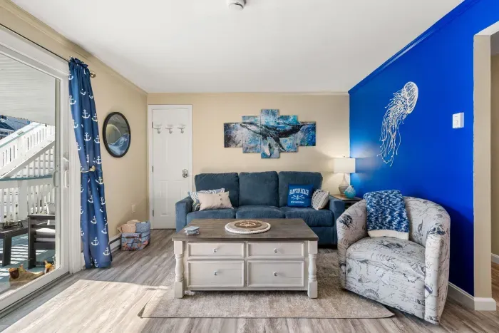 The living room has a smart tv and a pull out sofa!