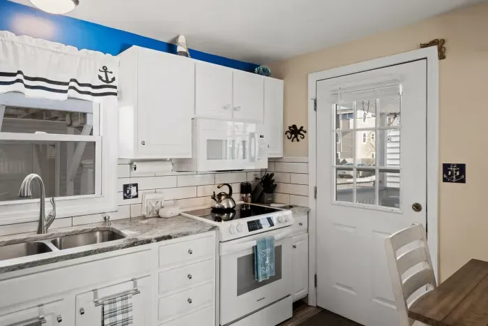 Fully equipped kitchen with updated appliances