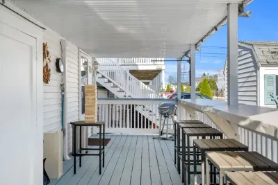 The deck with grill, ring toss, seating for 8, and Jenga!