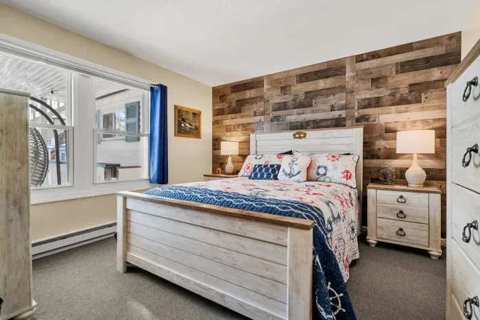 Primary bedroom with Queen bed and smart tv. Clean linens provided.