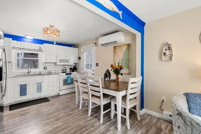 Dining table with seating for 6! There is a bench on the other side of this table