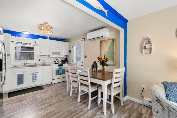 Dining table with seating for 6! There is a bench on the other side of this table