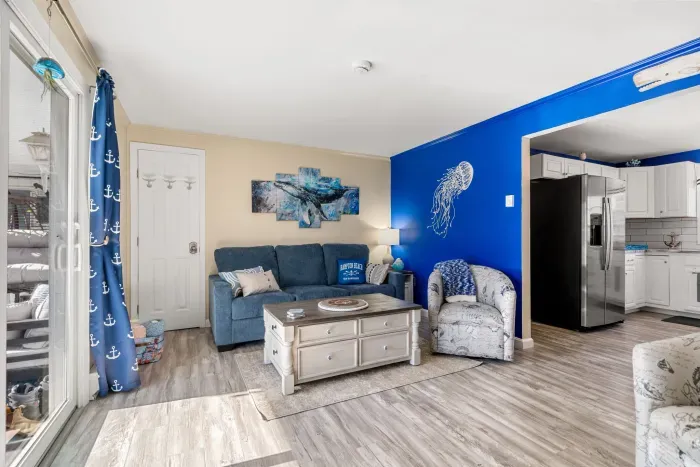 The living room has a smart tv and a pull out sofa!