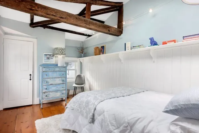 Bedroom #2 with full bed and sky light located on the 3rd floor