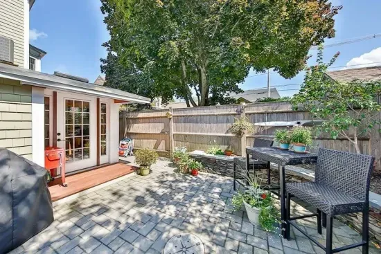 Private back patio with gas grill