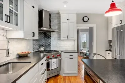 Ground level kitchen with all major appliances and 4-person eat-in island