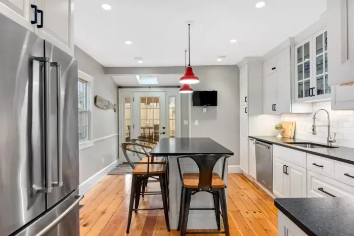 Ground level kitchen with all major appliances and 4-person eat-in island