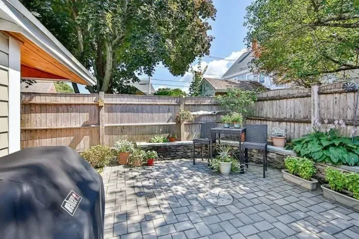 Private back patio with gas grill