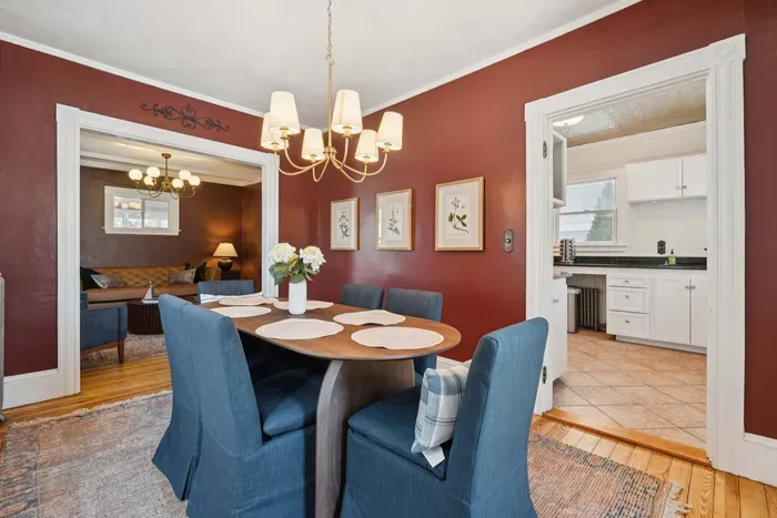 Dining room with seating in comfy chairs for 6