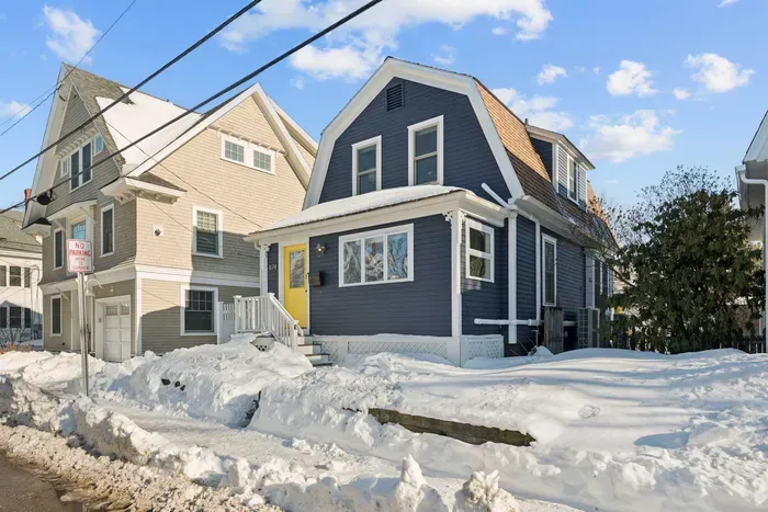 Exterior view of the home. Please note there is an off street parking spot to the left of the home, however it is a very tight parking spot but there is free street parking!