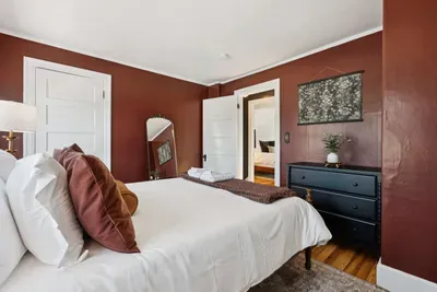 Bedroom #2 with a queen bed and smart TV. Clean linens provided.