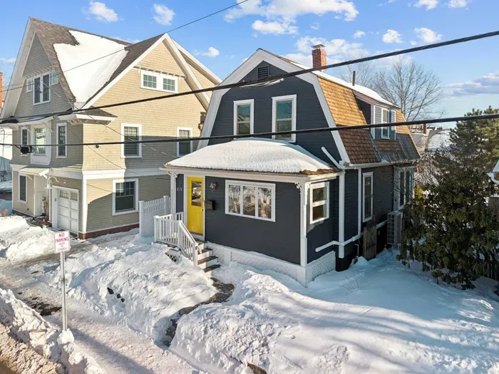 Exterior view of the home. Please note there is an off street parking spot to the left of the home, however it is a very tight parking spot but there is free street parking!