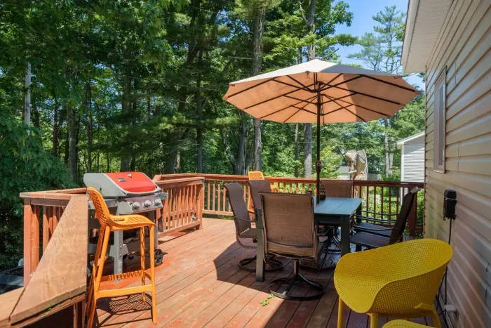 Relax on the deck after a beach day — just 10 mins from Wallis Sands