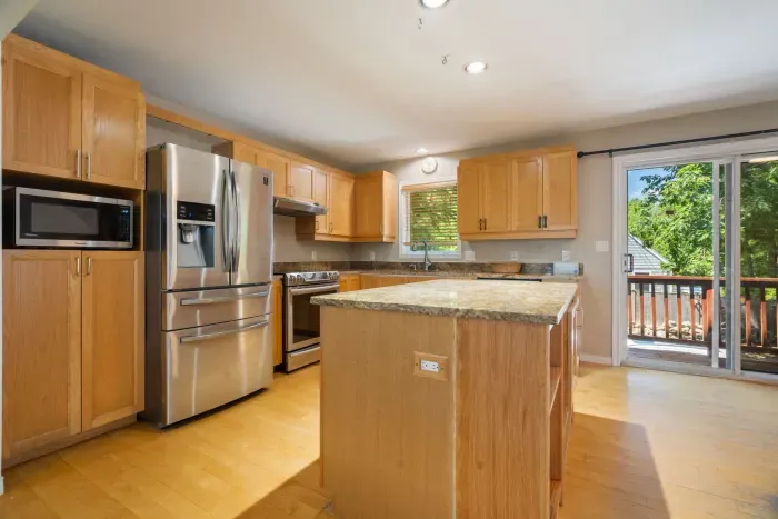 Fully equipped kitchen with updated appliances and 6-person dining table