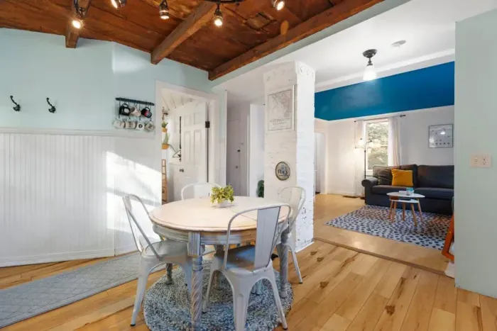 Fully equipped kitchen with updated appliances and 4 person dining table.