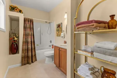 Ensuite bathroom, off the primary bedroom, with jetted shower tub.