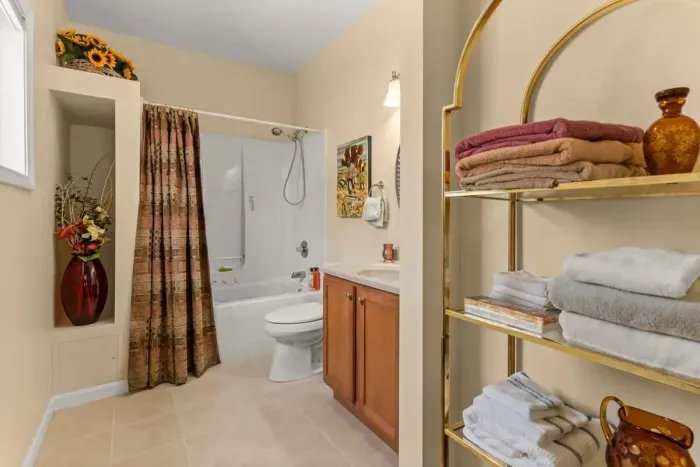 Ensuite bathroom, off the primary bedroom, with jetted shower tub.
