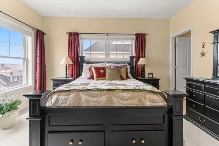 Primary bedroom with a queen-size bed and ensruite bathroom