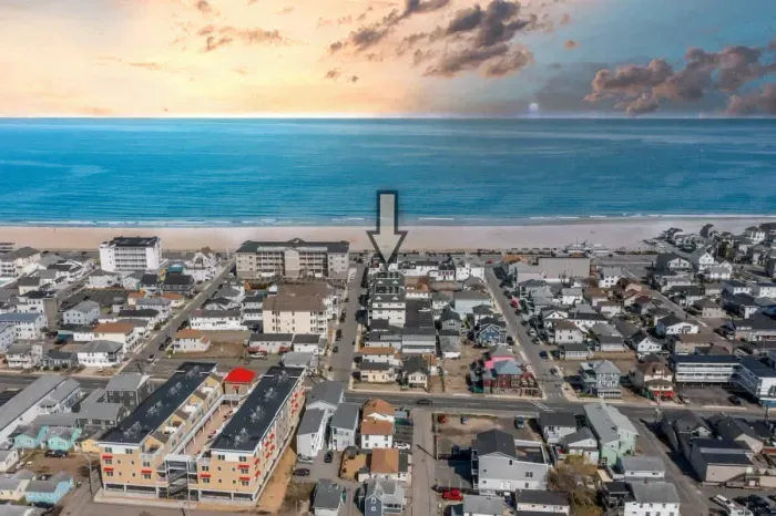 Aerial view of our condo, just steps to the beach, boardwalk and top attractions.