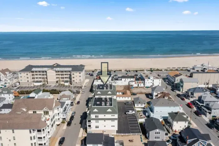 Aerial view of our condo, just steps to the beach, boardwalk and top attractions.