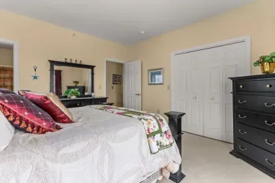 Primary bedroom with a queen-size bed and ensruite bathroom