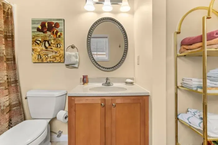 Ensuite bathroom, off the primary bedroom, with jetted shower tub.