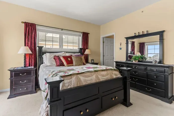 Primary bedroom with a queen-size bed and ensruite bathroom