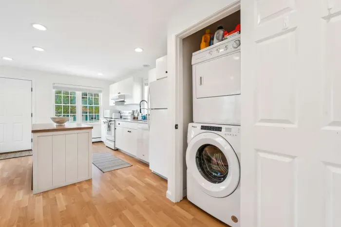 Washer and dryer located off the kitchen