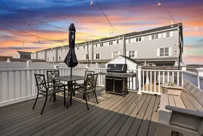 Private back deck with gas grill and views of the harbor