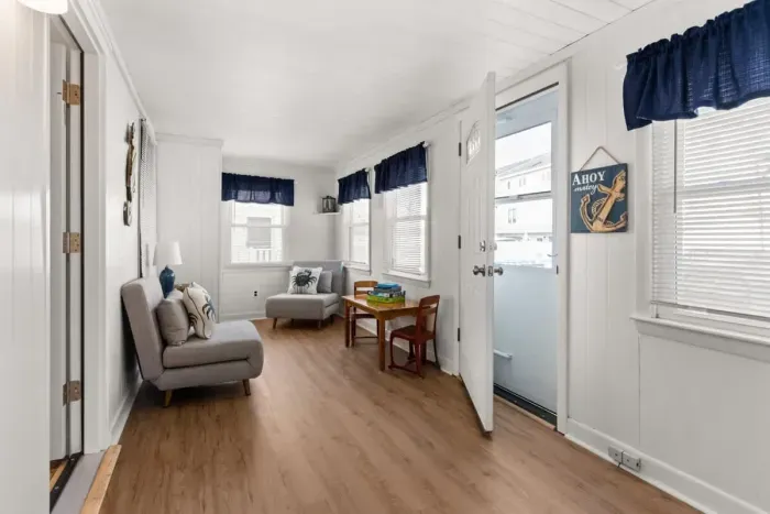 Back porch leading out to the private deck and grilling area