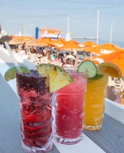 Enjoy drinks on Bernie's balcony