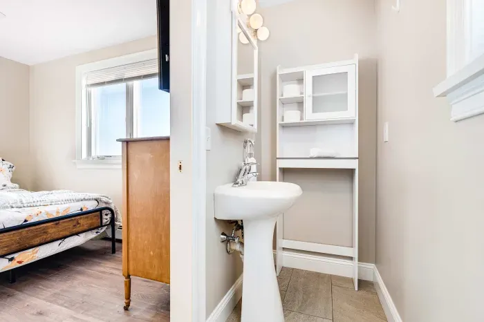 Primary Bedroom with double bed and 1/2 bath.  Clean linens provided. 