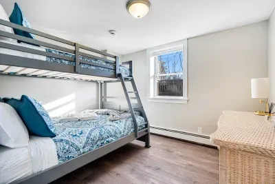 Bedroom #3 with twin bed over double.  Clean linens provided.