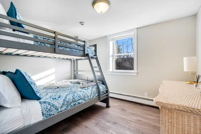 Bedroom #3 with twin bed over double.  Clean linens provided. 