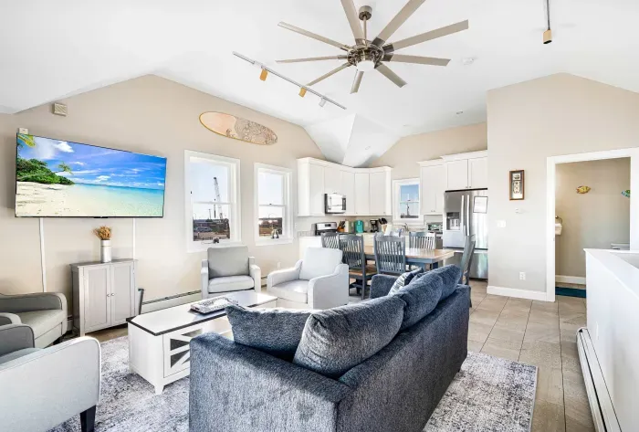 Main living area with large TV and ample seating.  Spectacular views all around!