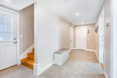 Bottom floor hallway and exit.