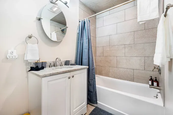 The second floor bathroom! This bathroom features a tiles shower/tub combo. Clean towels provided.