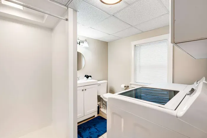 Large stand up shower on the lower level, this bathroom also has the washer and dryer for guest use.  Clean towels provided. 