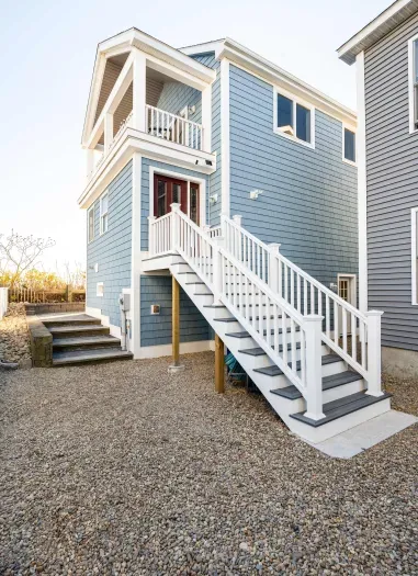 Main entrance from driveway to the second floor. 