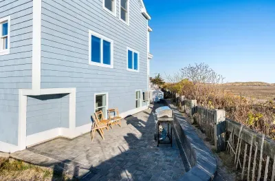 Brand new patio located in the back of the house, equipped with a grill and propane.
