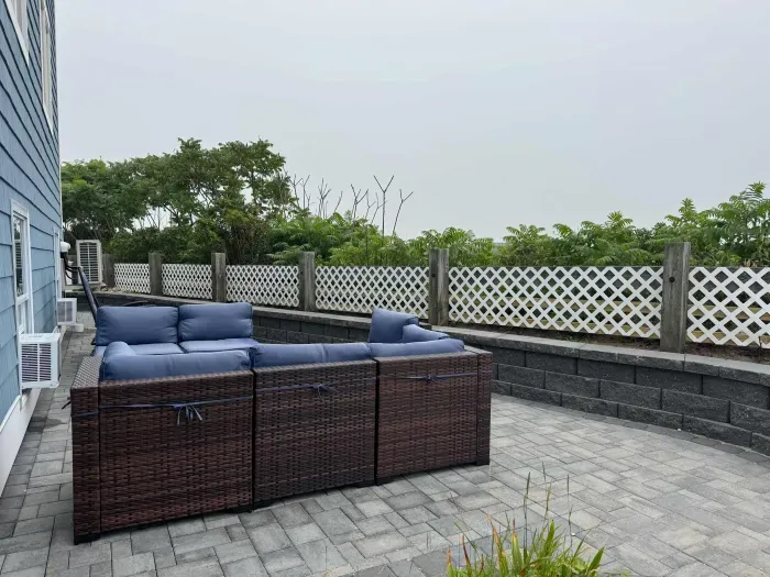 New outdoor furniture and patio! The grill is now towards the driveway